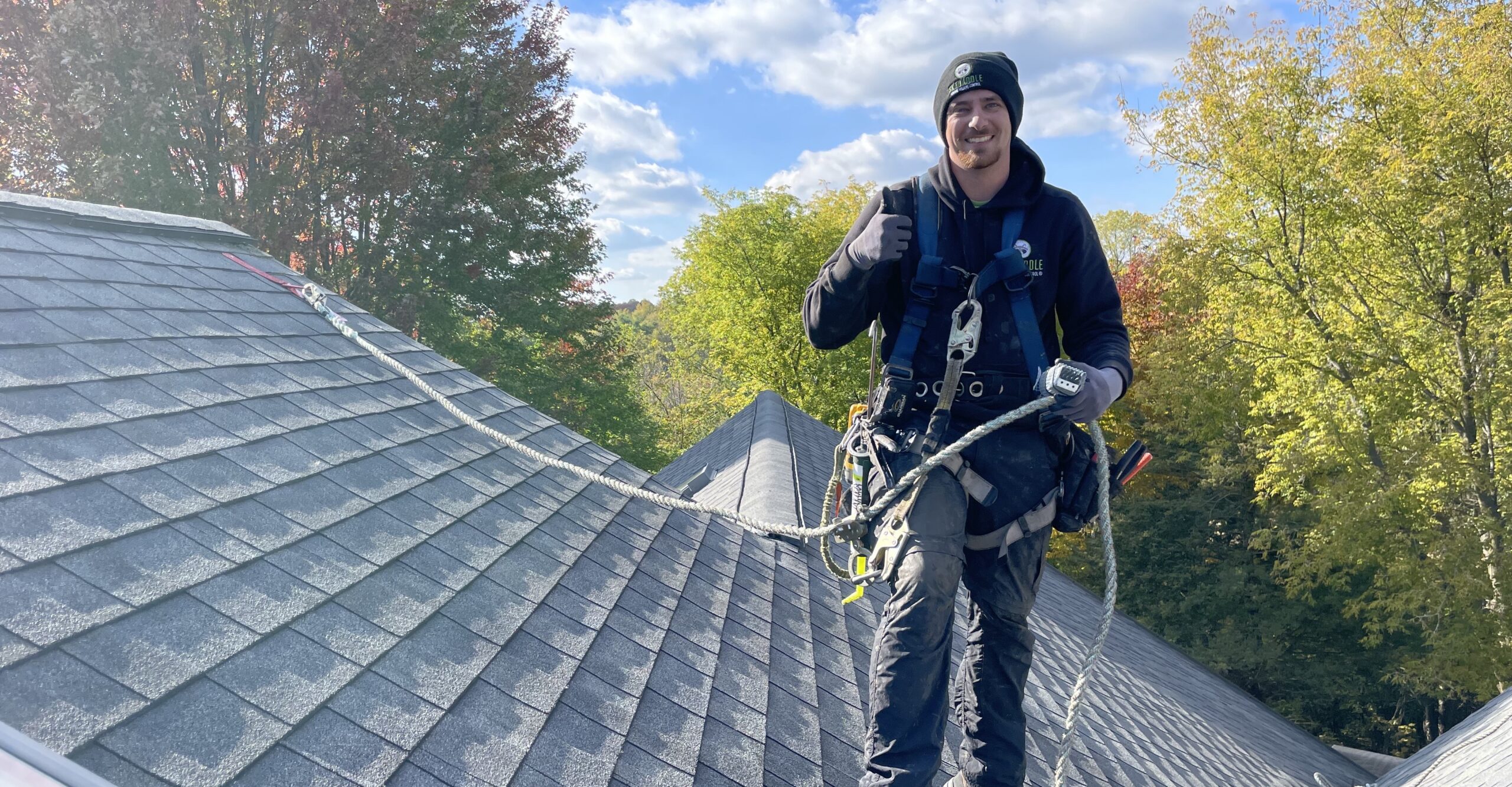 Milwaukee Madison Wisconsin technician on roof screening wildlife prevention skedaddle humane wildlife control October 2023