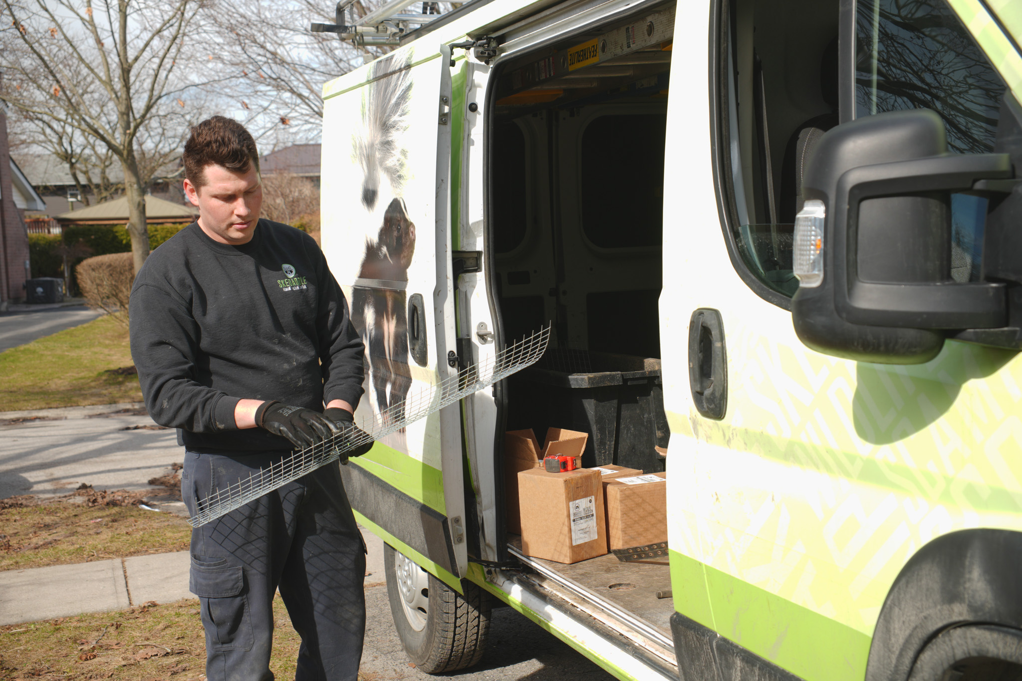 Technician holding a squirrel