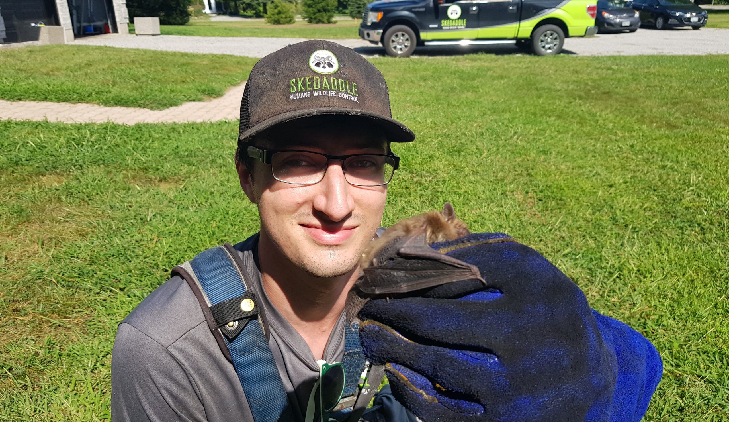 Technician holding a bat